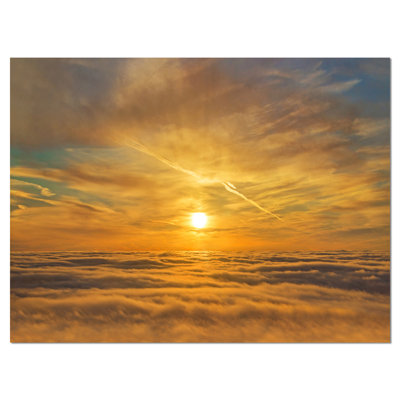 " Golden Sunset Over Clouds "