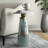 Glass and Wood Accent Table with Tapered Base and Modern Design.