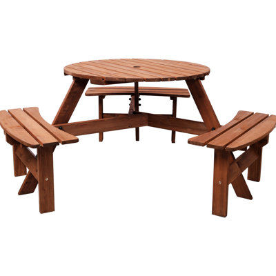 Table ronde de pique-nique en bois pour 6 personnes, idéale pour le jardin ou la terrasse. Elle comprend 3 bancs, un trou pour parasol, un plateau de 89 cm (35 pouces), et est stable et sûre. Couleur marron.