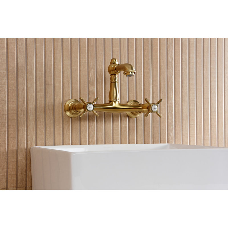 Kingston Brass Essex Two-Handle 2-Hole Wall Mount Bathroom Faucet, Brushed Brass
