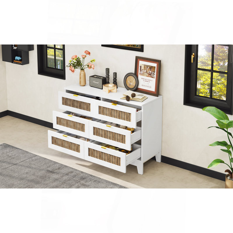 Charming Wooden Dresser With Six Drawers And Metal Handles, A Stylish And Practical Bedroom Storage Solution.