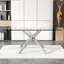 Table rectangulaire moderne avec pieds en verre trempé et en métal argenté pouvant accueillir 4 à 6 personnes, ajoutant du style à la décoration intérieure