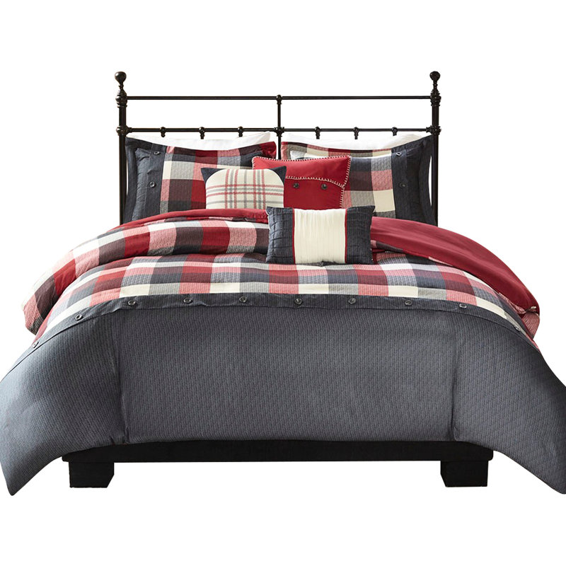 Housse de couette à chevrons avec bordure imprimée et coussins décoratifs aux couleurs chaudes pour le décor de la chambre à coucher