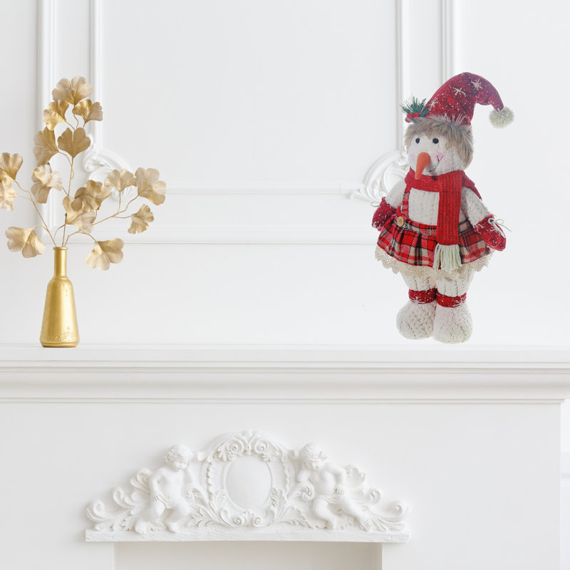 Bonhomme de neige avec jupe en peluche