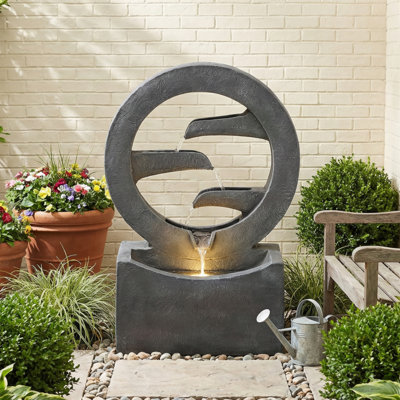Fontaine circulaire en polyrésine pour l'extérieur H 26,77 "avec lumière DEL, cascade d'eau moderne et autoportante pour patio