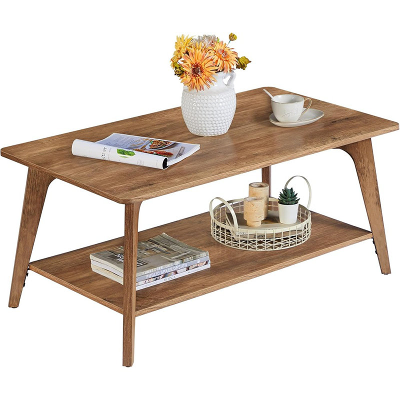 Table basse à 2 niveaux avec rangement, pieds fuselés et transitions courbées