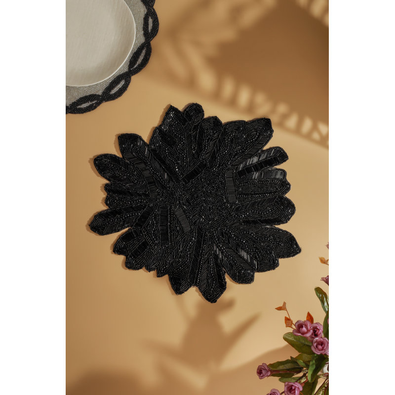 Le chargeur perlé «Obsidian Bloom»