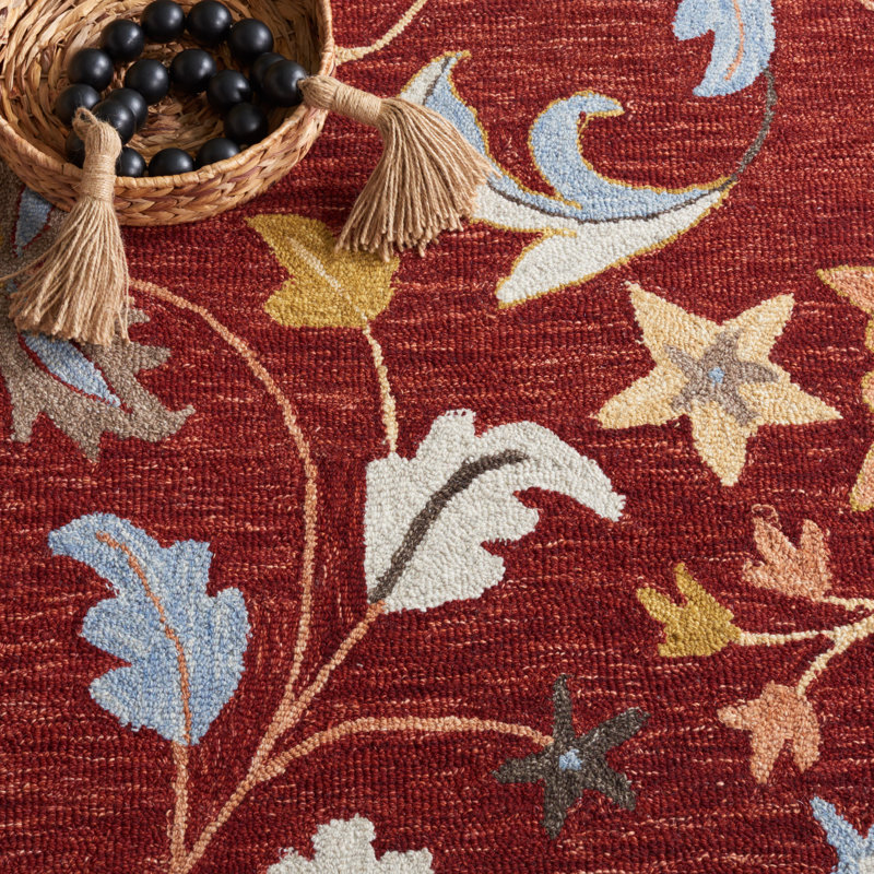 Handmade Red and Orange Floral Wool Area Rug, 5' x 8'