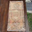 Tapis turc rétro de petite taille idéal comme paillasson avec un motif en laine Oushak antique orange vif