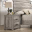 Table de chevet moderne avec deux tiroirs gris pour une chambre à coucher sophistiquée