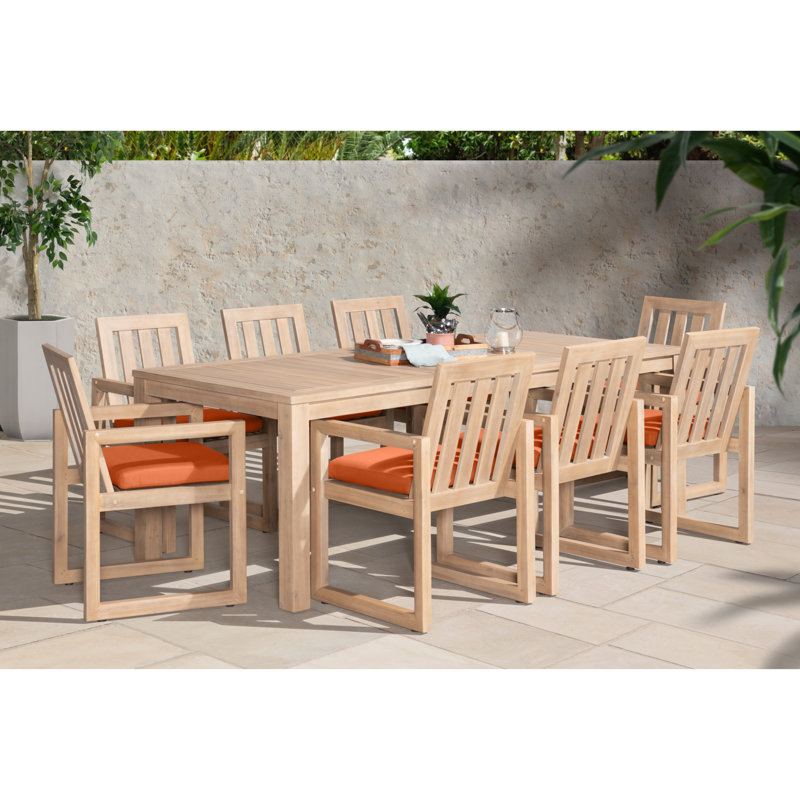 Sehrish Rectangular 8 - Person 87" Long Dining Set With Sunbrella Cushion Covers, Spectrum Cayenne Sunbrella® Plainweave