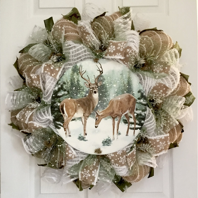 Couronne d'hiver avec rassemblement de cerfs