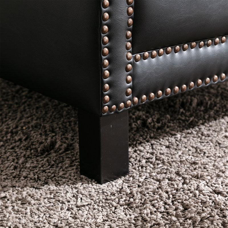 Fauteuil club en cuir Amento A avec garniture cloutée noir Amento
