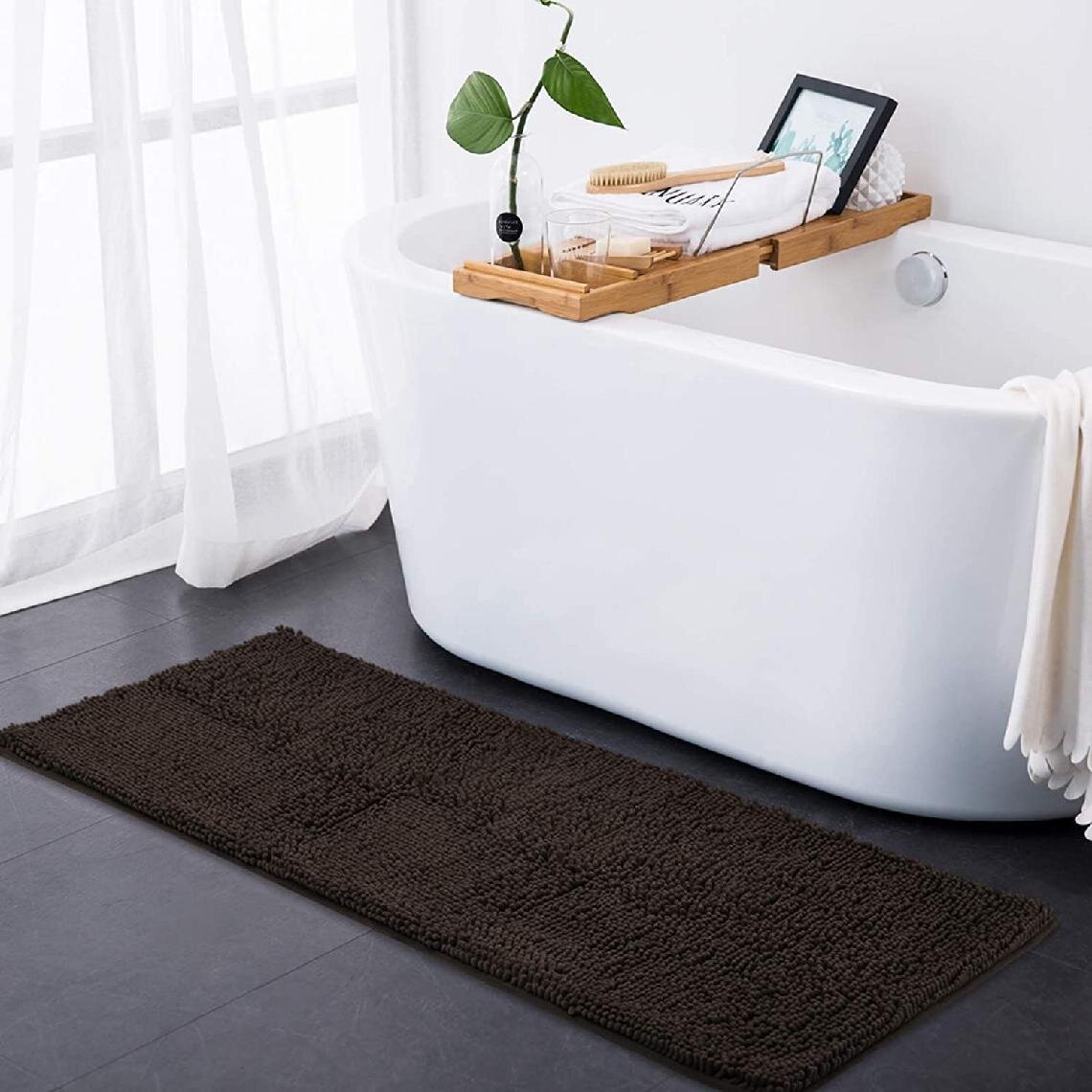 https://assets.wfcdn.com/im/10429867/compr-r85/1631/163148837/esqueda-microfiber-bath-rug-with-non-slip-backing.jpg