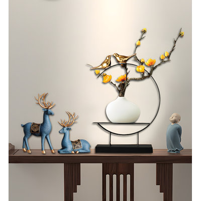 Ornement en forme de vase cerf