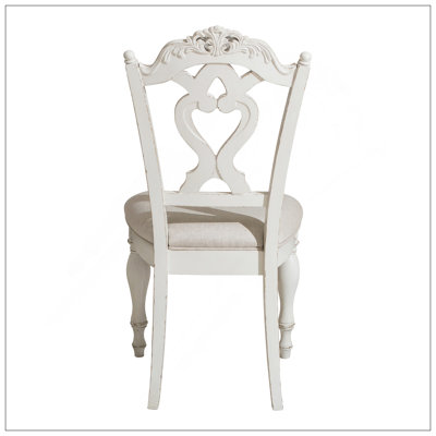Chaise de bureau blanche antique de style victorien avec siège rembourré, sculpture traditionnelle et fabrication durable pour un bureau à domicile élégant.