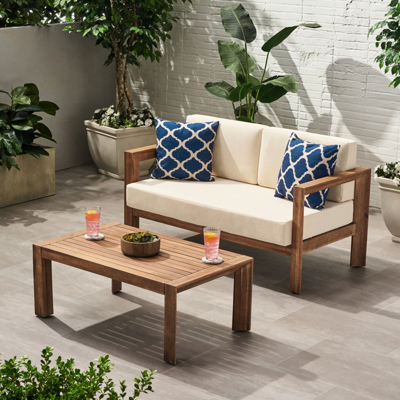 Table basse en bois et bois, rembourrage hydrofuge, dossier ouvert avec sièges à lattes, coussins imperméables beige et brun