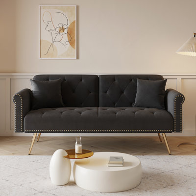 Luxueux canapé-lit en velours avec garniture cloutée et coussin décoratif assorti, pour une vie élégante et confortable