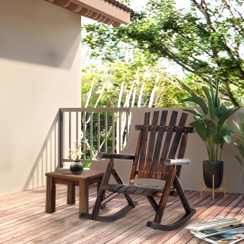 Chaise berçante en bois brun
