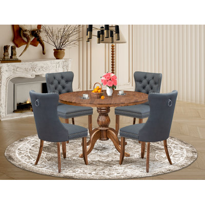 Cet ensemble de salle à manger 5 pièces comprend une table de cuisine et 4 chaises de salle à manger en tissu de polyester gris platine avec dossier capitonné - Finition noyer antique