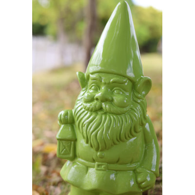 Statue de nain de jardin tenant une lanterne - mauve