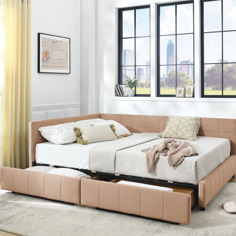 Grand lit confortable, revêtement en velours rose, construction avec rangement pour la chambre à coucher et le salon, structure en bois d'eucalyptus