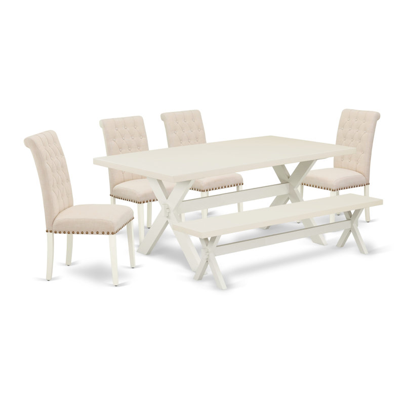 L'ensemble de table de salle à manger 6 pièces contient une table de cuisine rectangulaire avec pieds en X et 4 chaises Parson en tissu de lin beige clair avec un banc, lin blanc