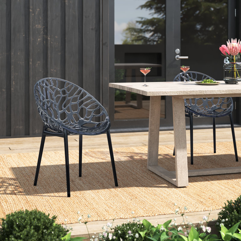 Chaise empilable pour ensemble à diner de patio Metrocles, Noir transparent