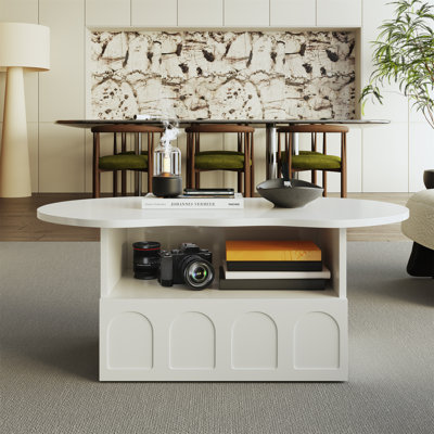 Table basse en forme de nuage avec rangement et porte rabattable Ernesto