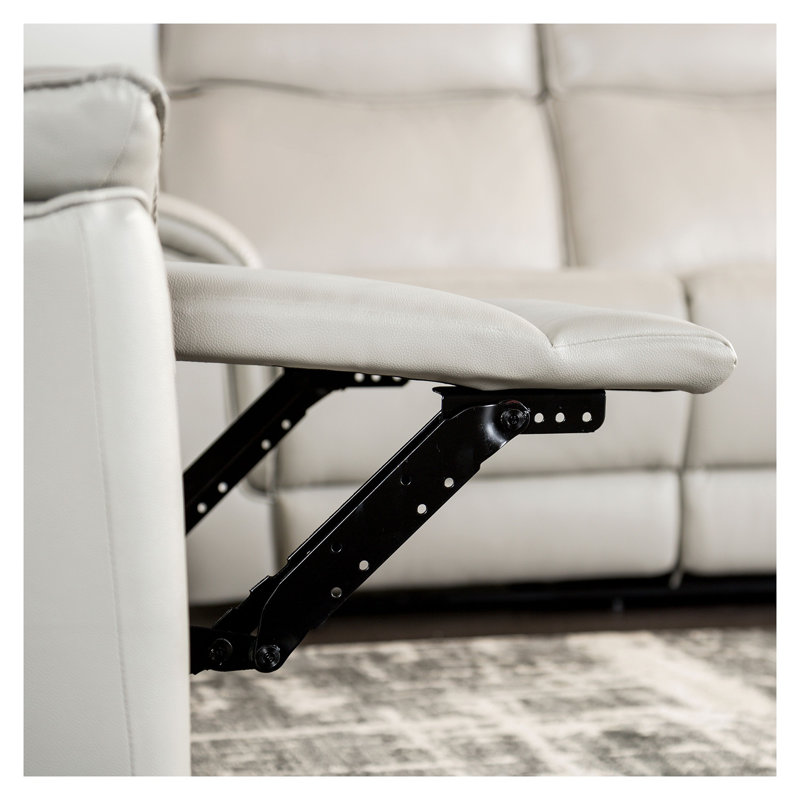 Fauteuil inclinable transitionnel en cuir taupe assorti avec bordure en passepoil et accoudoirs évasés