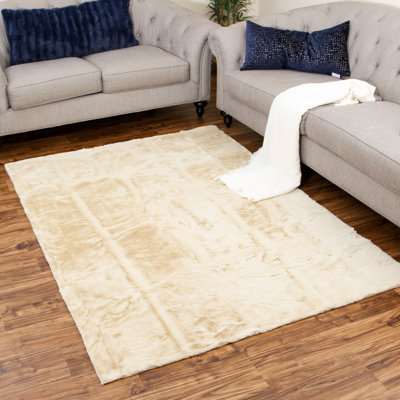 Tapis à poils longs beige / crème Brideau