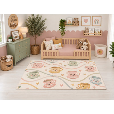 Tapis d'intérieur ultramince 152 x 213 cm (5' x 7') avec motif de tasses souriantes, idéal pour la chambre d'enfant, la garderie, la salle de classe et la salle de jeux. Doux et à poils courts, avec revêtement antidérapant en silicone.