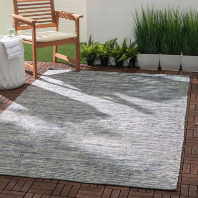 Tapis intérieur / extérieur bleu uni tissé à la main