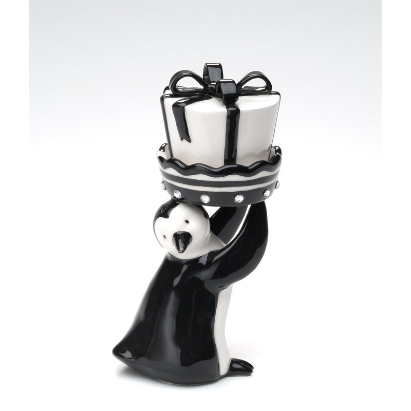 Ensemble de salière et poivrière Cosmos Cadeaux tenant un cadeau