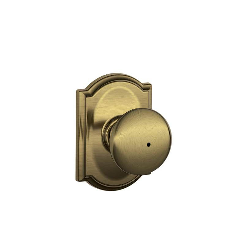 Plymouth Knob with Camelot Trim Bed and Bath Lock, Antique Brass