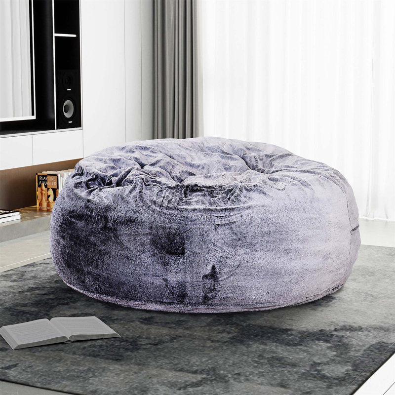 Fauteuil à billes rond en mousse à mémoire de forme avec housse en fausse fourrure moelleuse pour un confort et une détente ultimes.