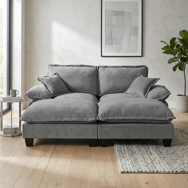 Canapé modulaire inspiré d'un voilier avec repose-pieds mobile