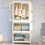 Armoire, organisateur de rangement, garde-robe portative pour vêtements, commode, portes magnétiques avec 4 cubes et tringle, 10 cintres
