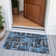 Tapis noir intérieur / extérieur lavable à la machine