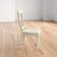 Chaise d'appoint à dossier croisé en bois massif vieilli blanc vieilli