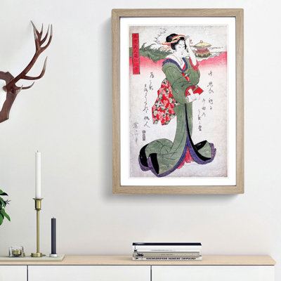 Elegant Woman by Kikukawa Eizan - Framed Print