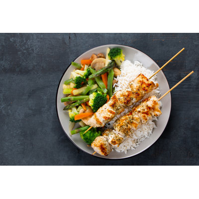 Chicken Skewers With Steamed Vegetables And Long Rice by ASIFE - Wrapped Canvas Print