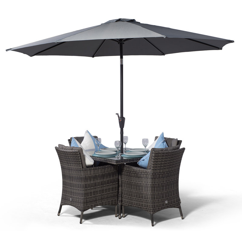 Karcher 4 - Person Wicker Patio Dining Set with Square Table , Cushions Included
