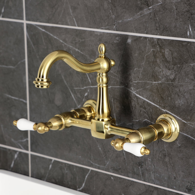 Kingston Brass Heritage Double-Handle 2-Hole Wall-Mount Bridge Kitchen Faucet, Brushed Brass