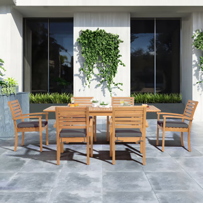 Kilani 6 - Person Acacia Wood Patio Dining Set with Extendable Rectangular Table , Cushions Included