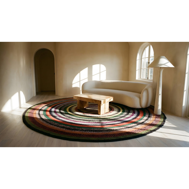 Tapis rond tressé antique à motif circulaire