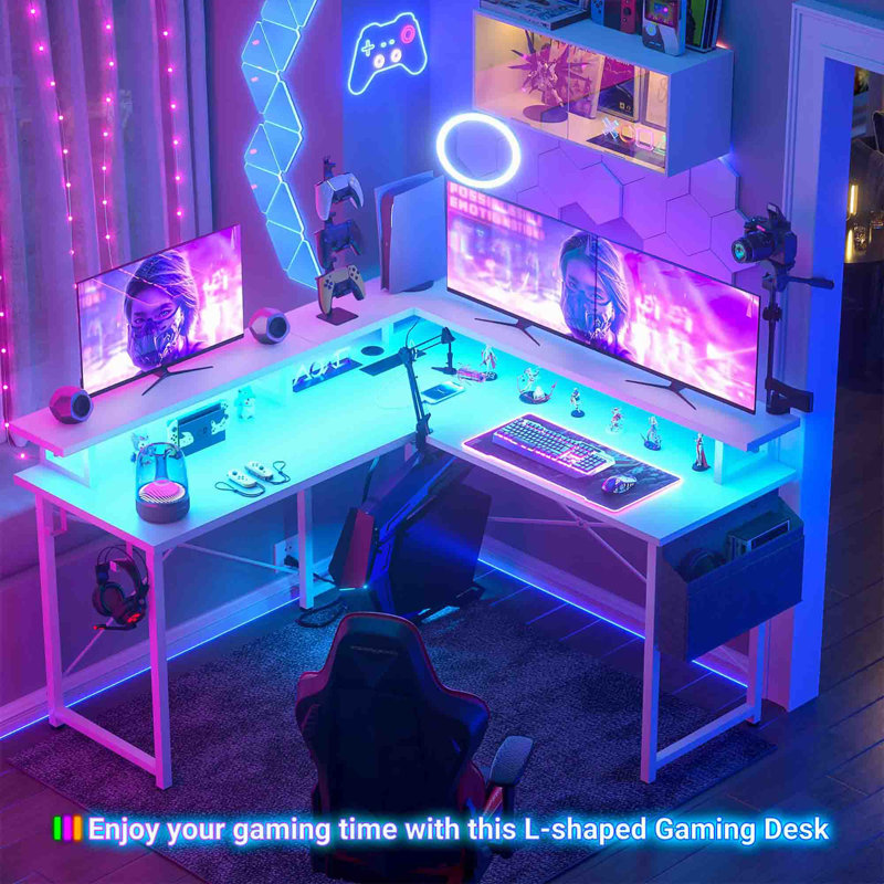 Black L-Shaped Gaming Desk with Power Outlets and Storage