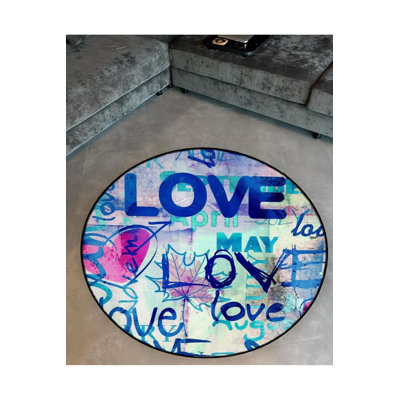 Tapis rond lavable à la machine rose
