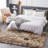 Malaiah Shag Faux Sheepskin Fur Area Rug in Beige-1737632522