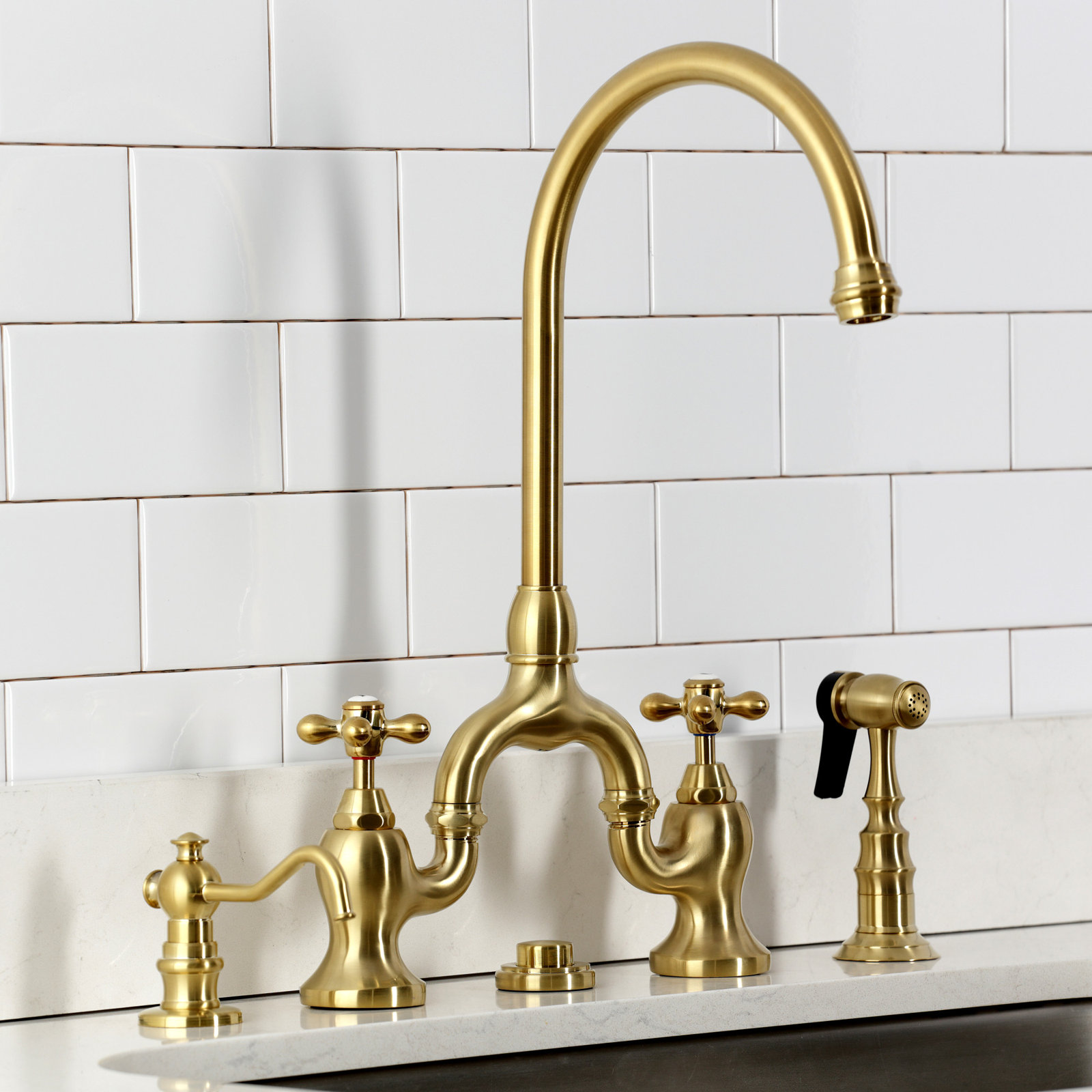Kingston Brass English Country Two-Handle 3-Hole Deck Mount Bridge Kitchen Faucet with Side Sprayer, Brushed Brass